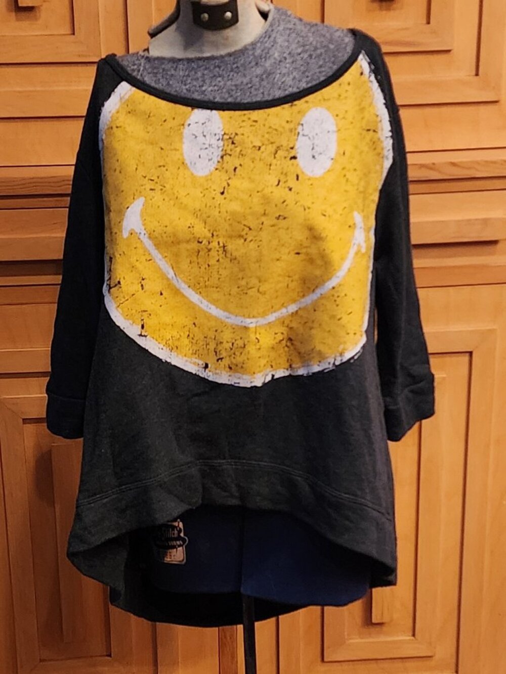 Smiley face light sweatshirt